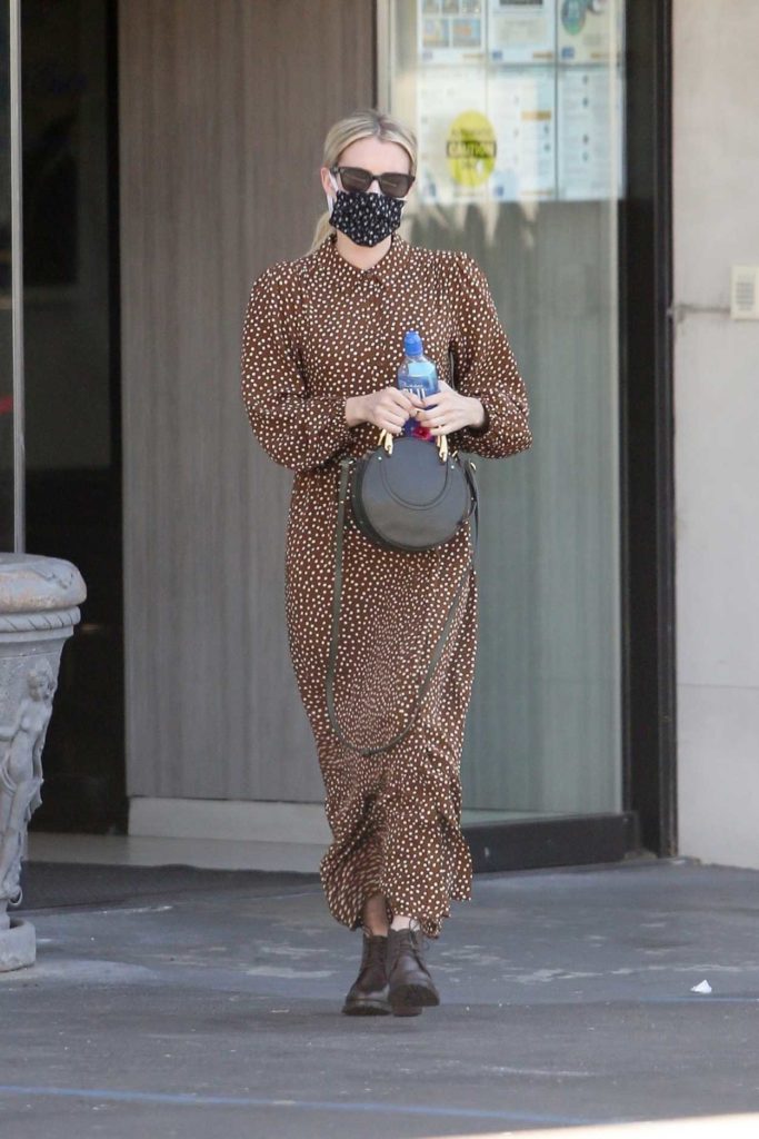 Emma Roberts in a Protective Mask