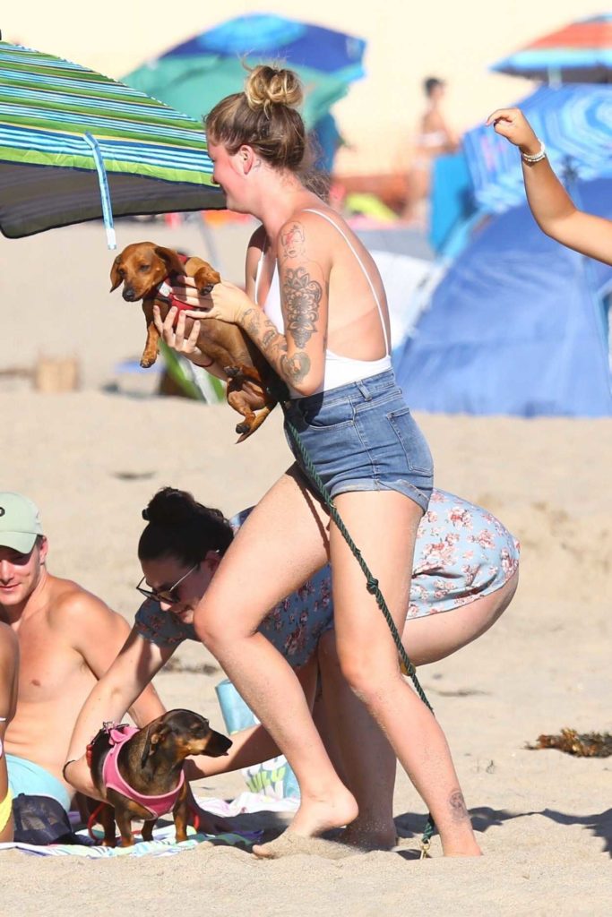 Ireland Baldwin in a White Swimsuit