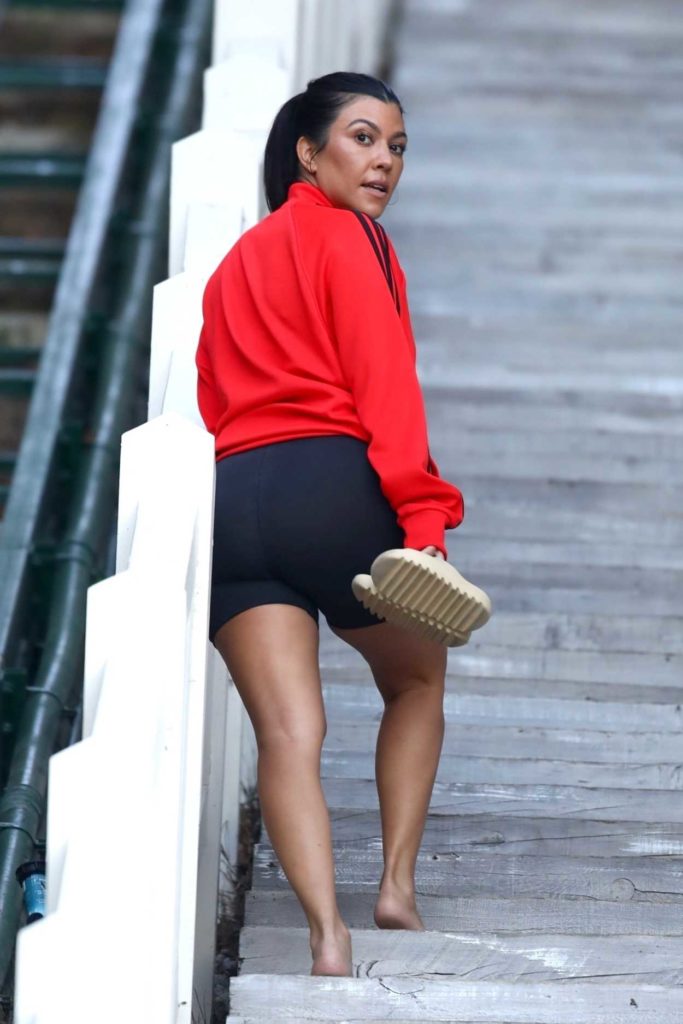 Kourtney Kardashian in a Red Adidas Track Jacket