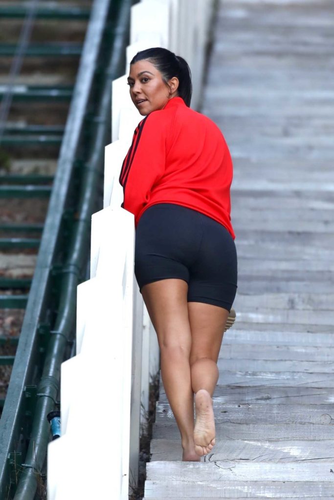 Kourtney Kardashian in a Red Adidas Track Jacket