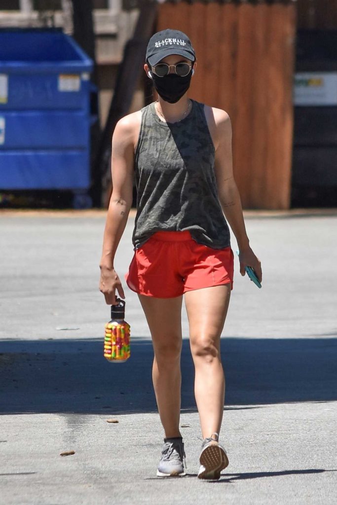 Lucy Hale in a Red Shorts