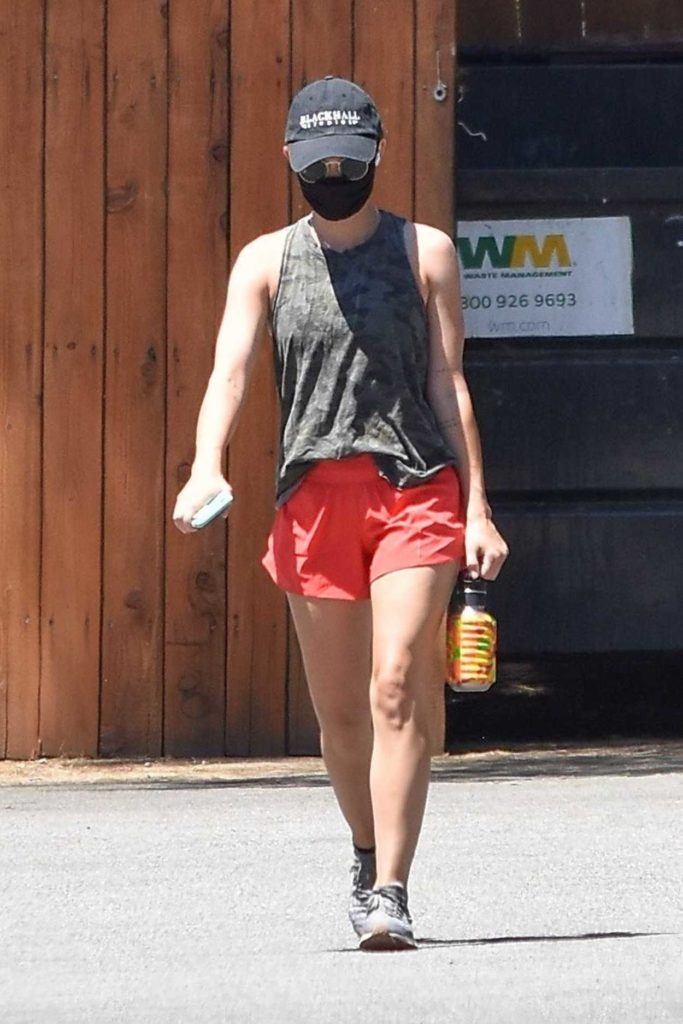 Lucy Hale in a Red Shorts