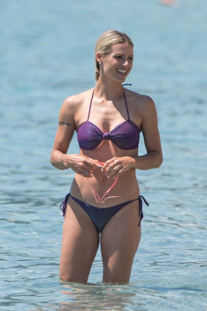 Michelle Hunziker in a Purple Bikini