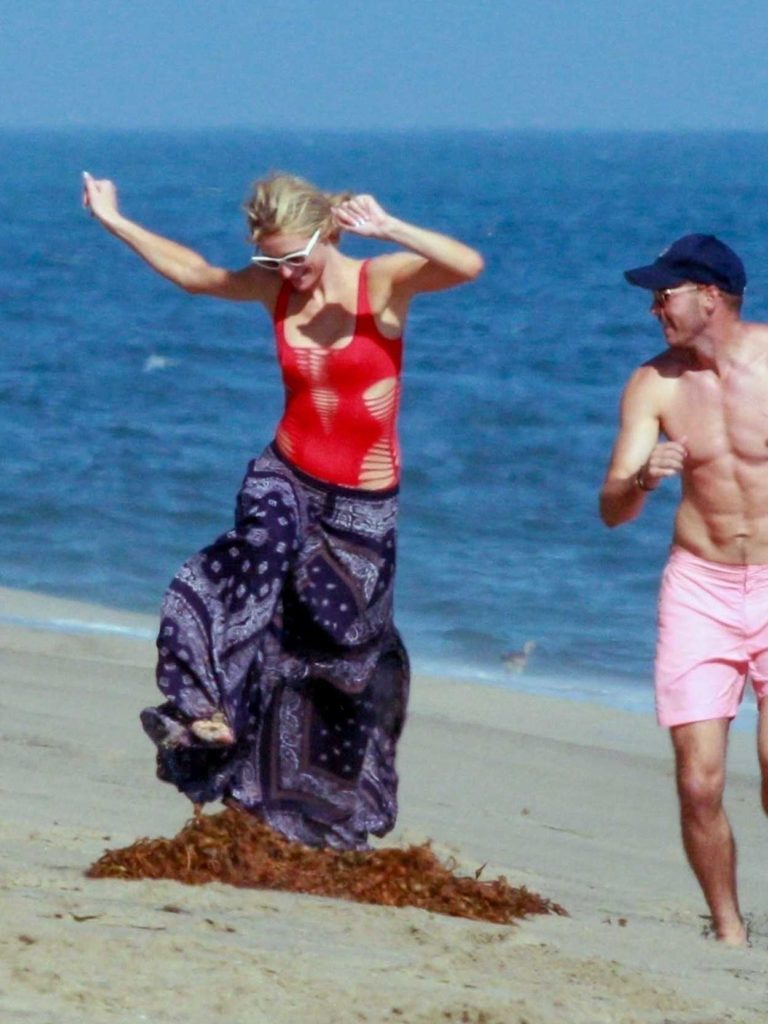 Paris Hilton in a Red Swimsuit