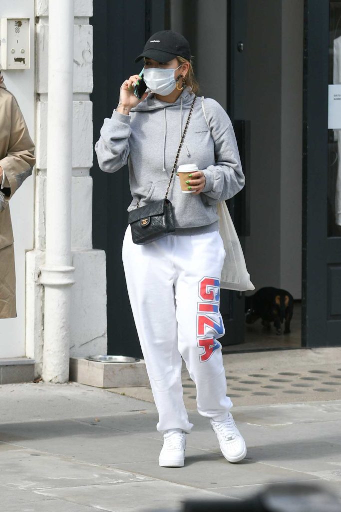 Rita Ora in a Gray Hoody
