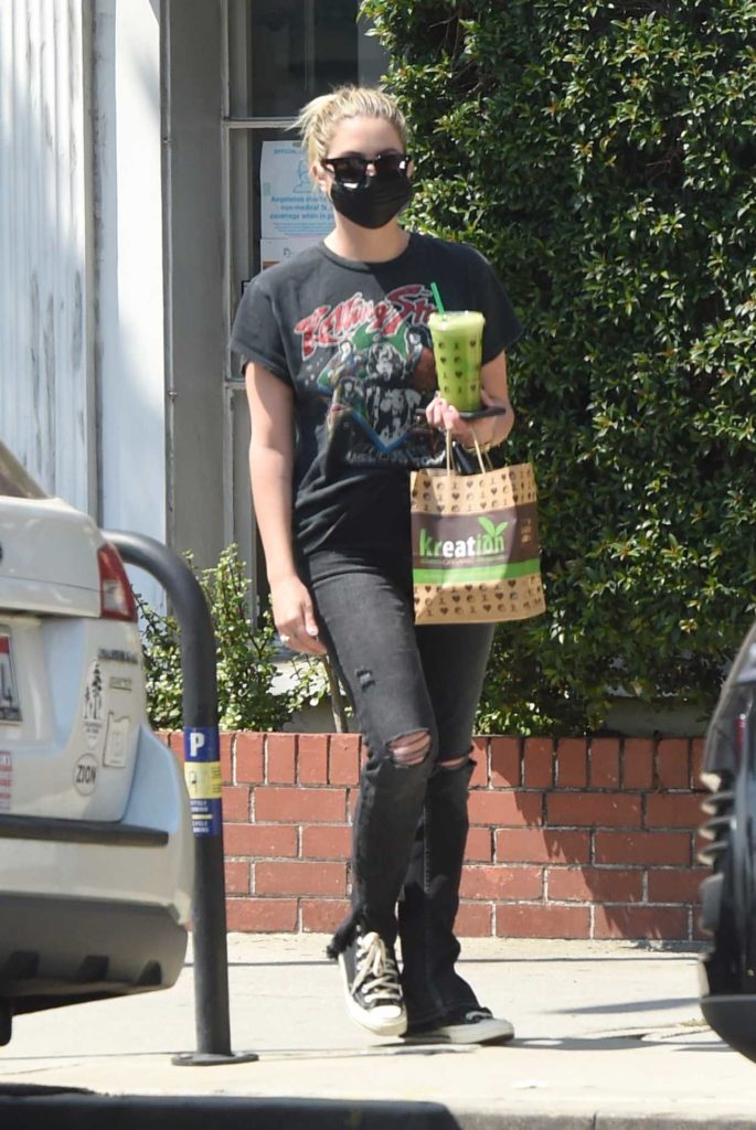 Ashley Benson in a Black Protective Mask