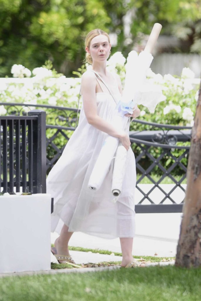 Elle Fanning in a White Summer Dress
