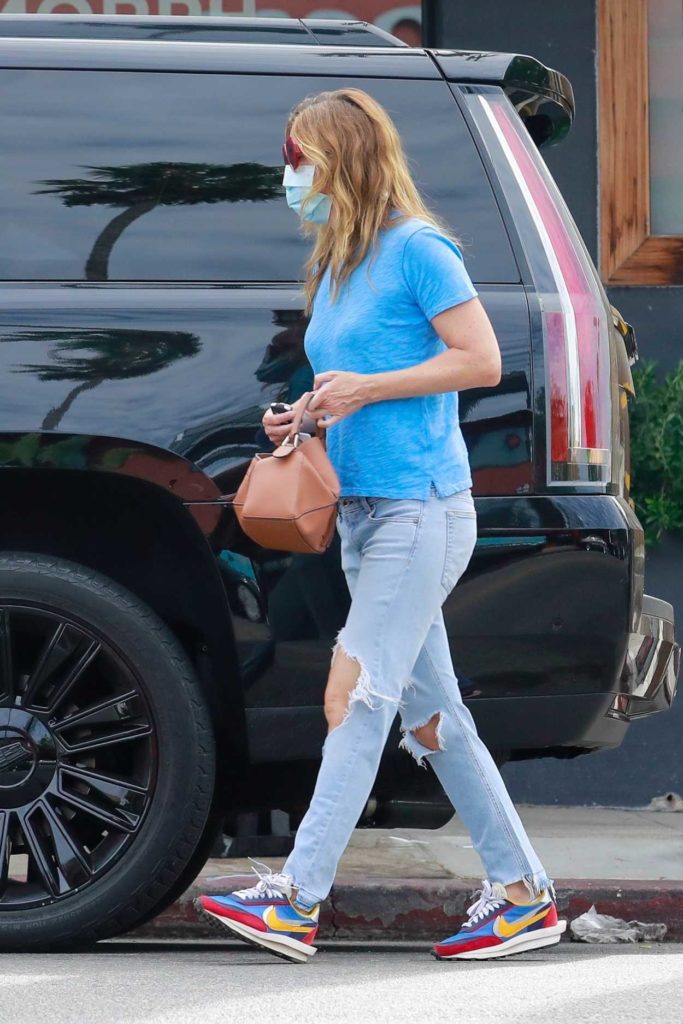 Ellen Pompeo in a Blue Ripped Jeans
