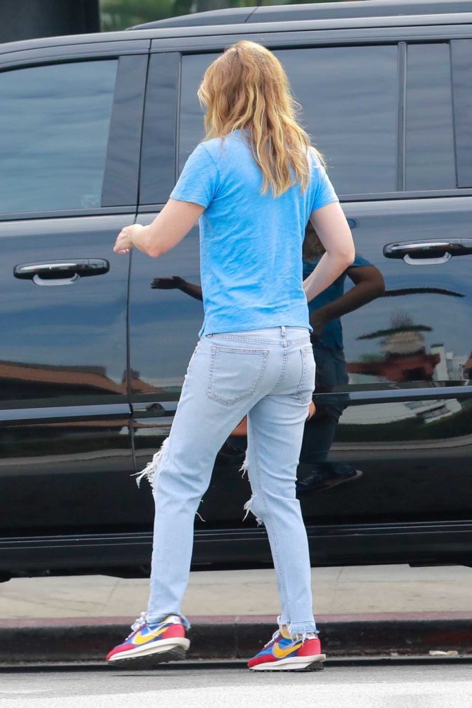 Ellen Pompeo in a Blue Ripped Jeans
