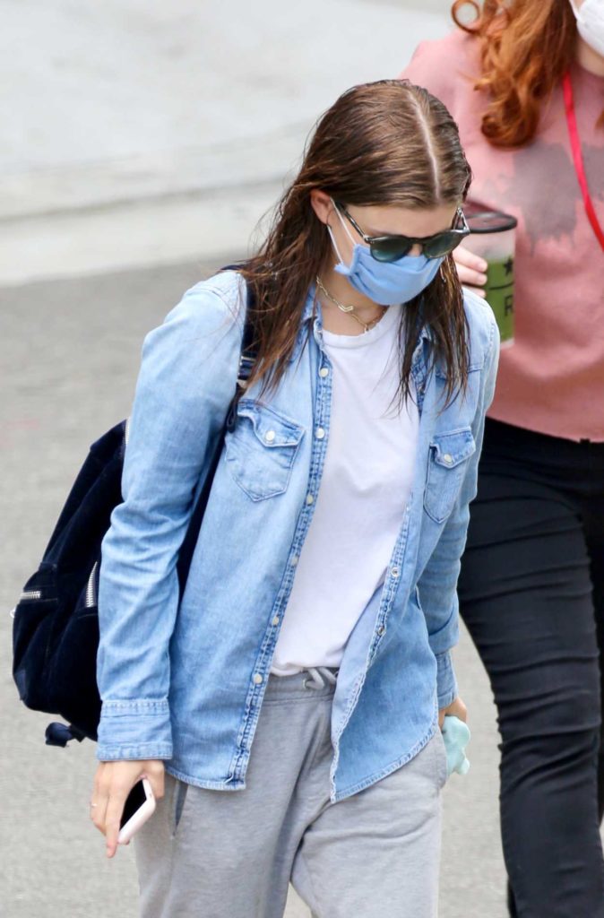 Kate Mara in a Blue Protective Mask