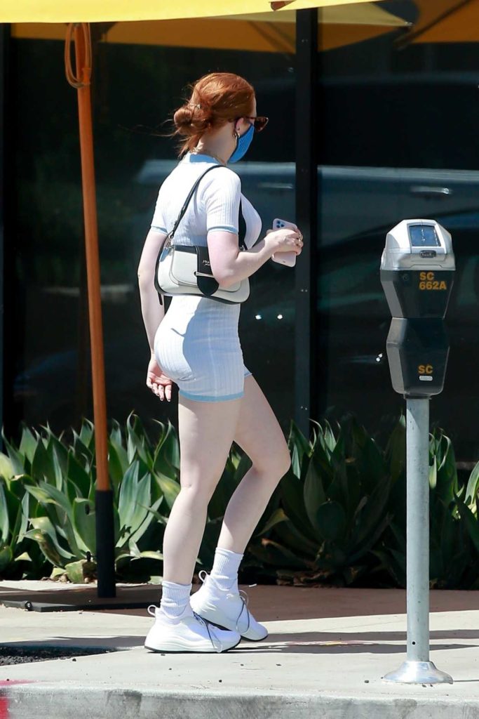 Madelaine Petsch in a Blue Protective Mask