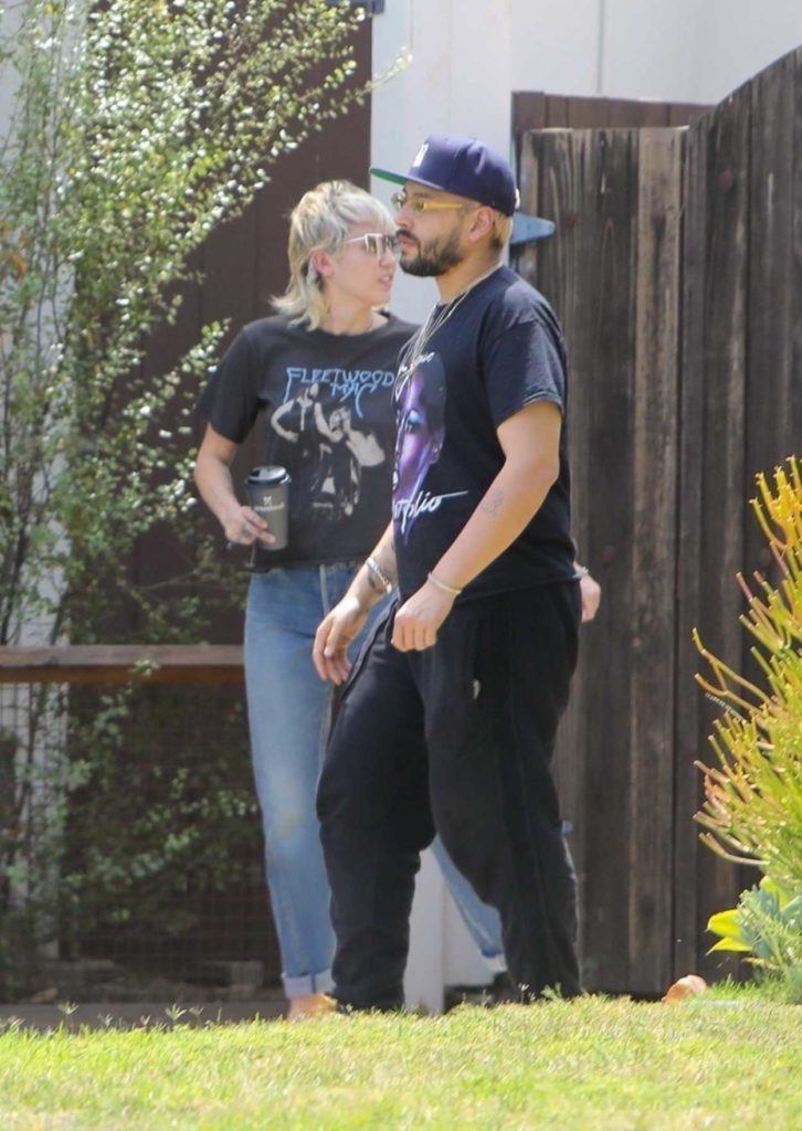 Miley Cyrus in a Black Tee