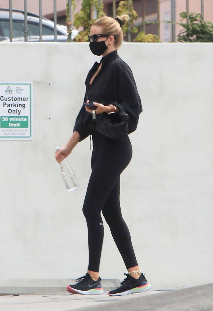 Rosie Huntington-Whiteley in a Black Protective Mask