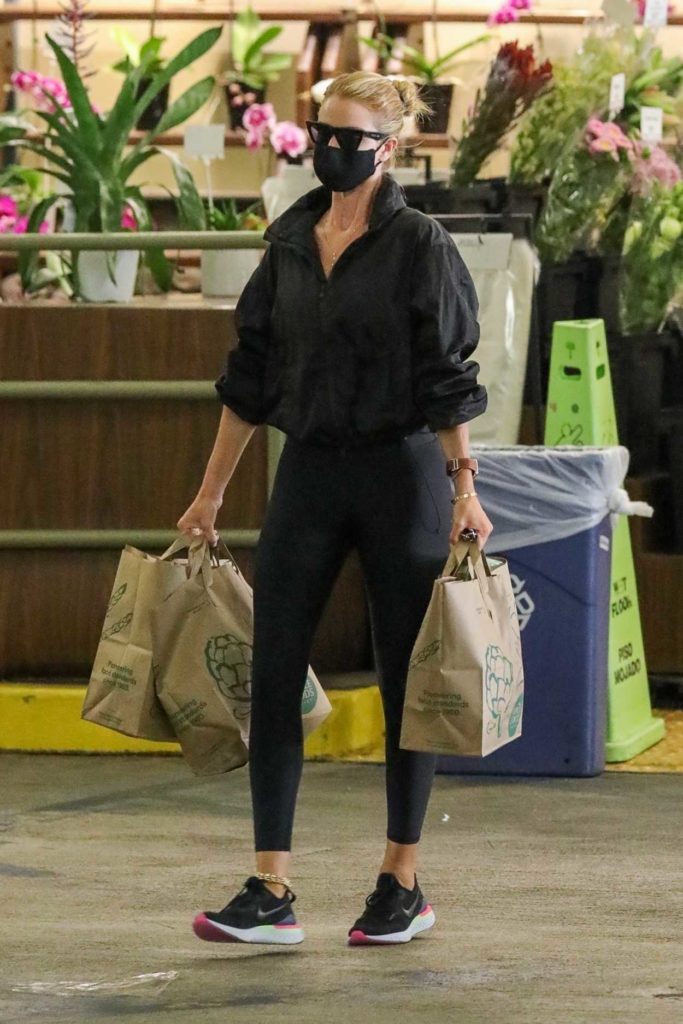 Rosie Huntington-Whiteley in a Black Protective Mask