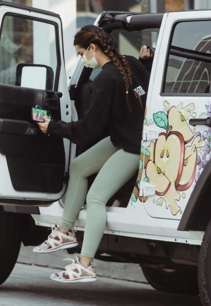 Addison Rae in an Olive Leggings