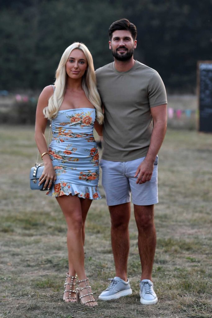 Amber Turner in a Light Blue Floral Print Dress