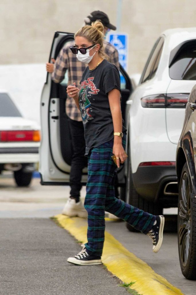 Ashley Benson in a Converse Trainers