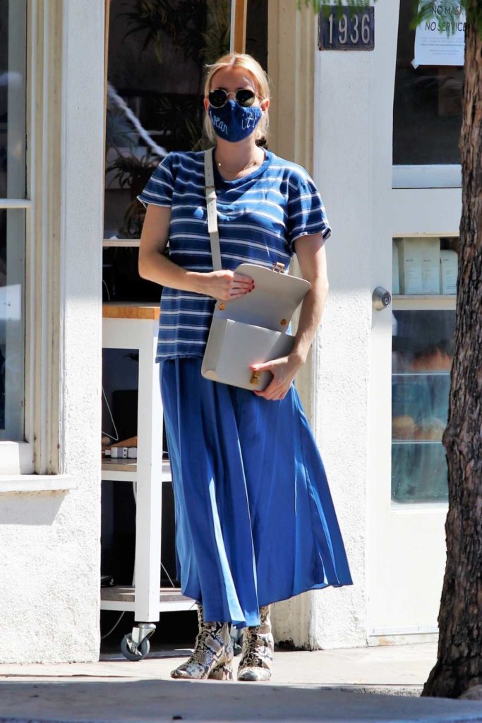 Emma Roberts in a Blue Striped Tee