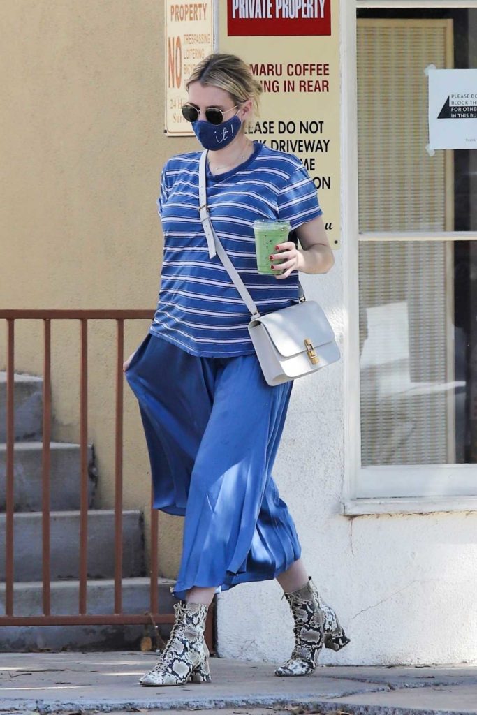 Emma Roberts in a Blue Striped Tee