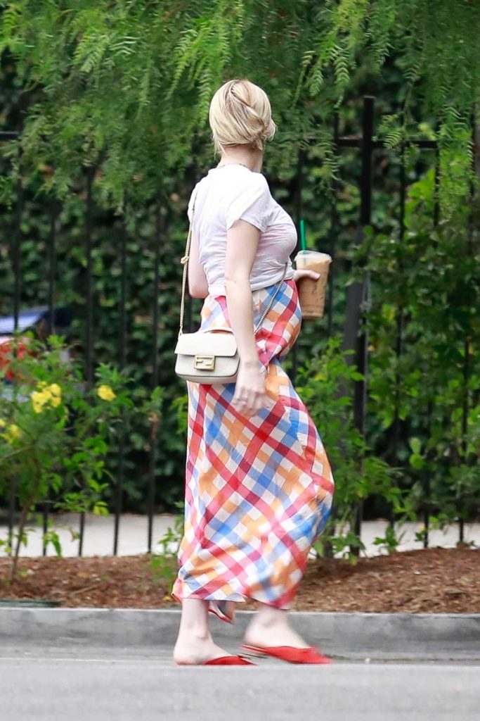 Emma Roberts in a Colorful Skirt