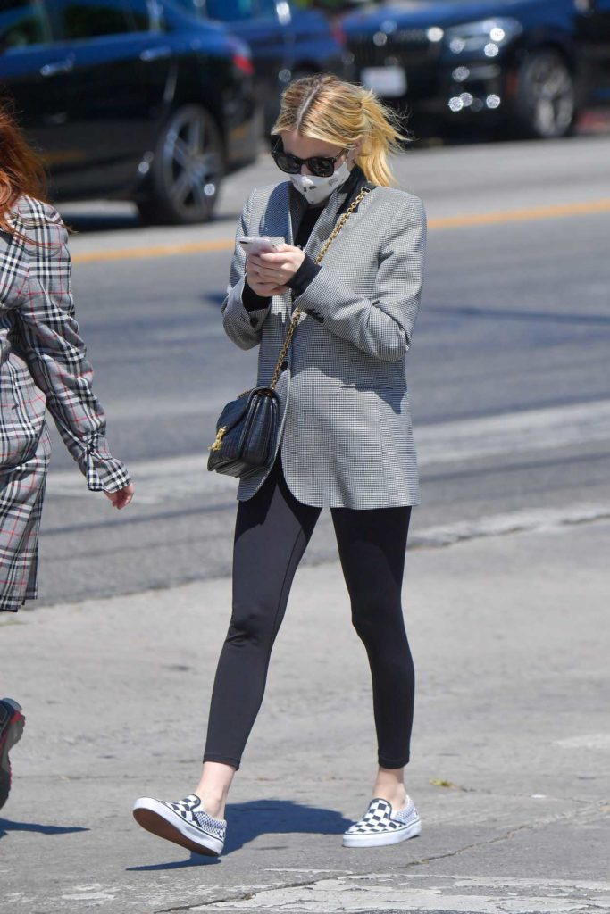 Emma Roberts in a Gray Blazer