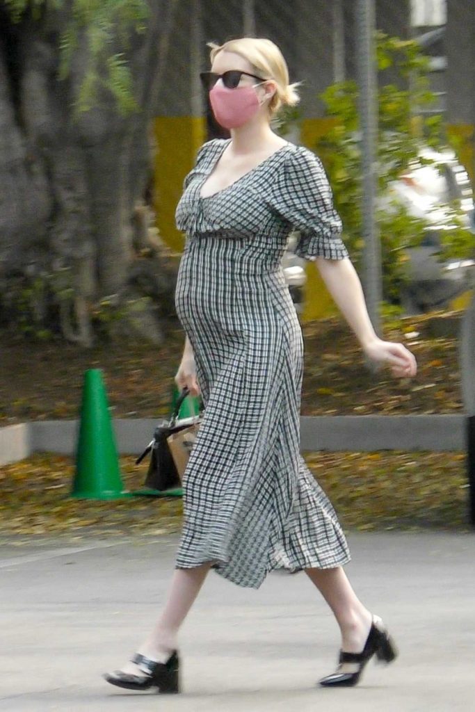 Emma Roberts in a Grey Dress