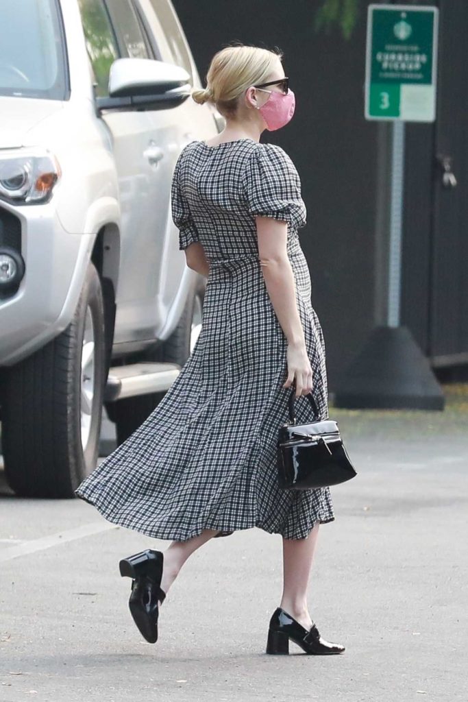 Emma Roberts in a Grey Dress