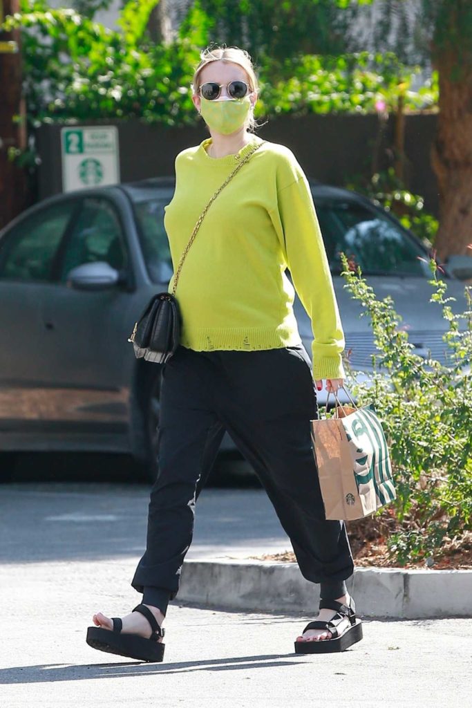 Emma Roberts in a Neon Green Sweatshirt