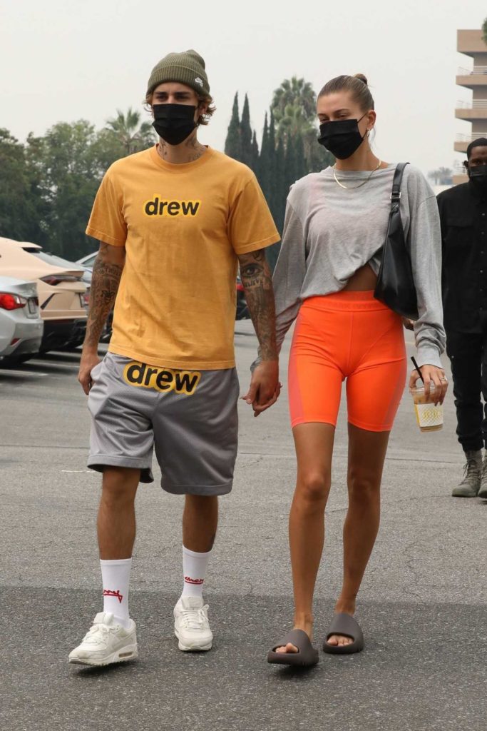 Hailey Bieber in an Orange Spandex Shorts