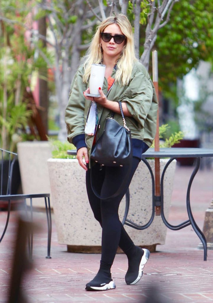 Hilary Duff in a Green Bomber Jacket