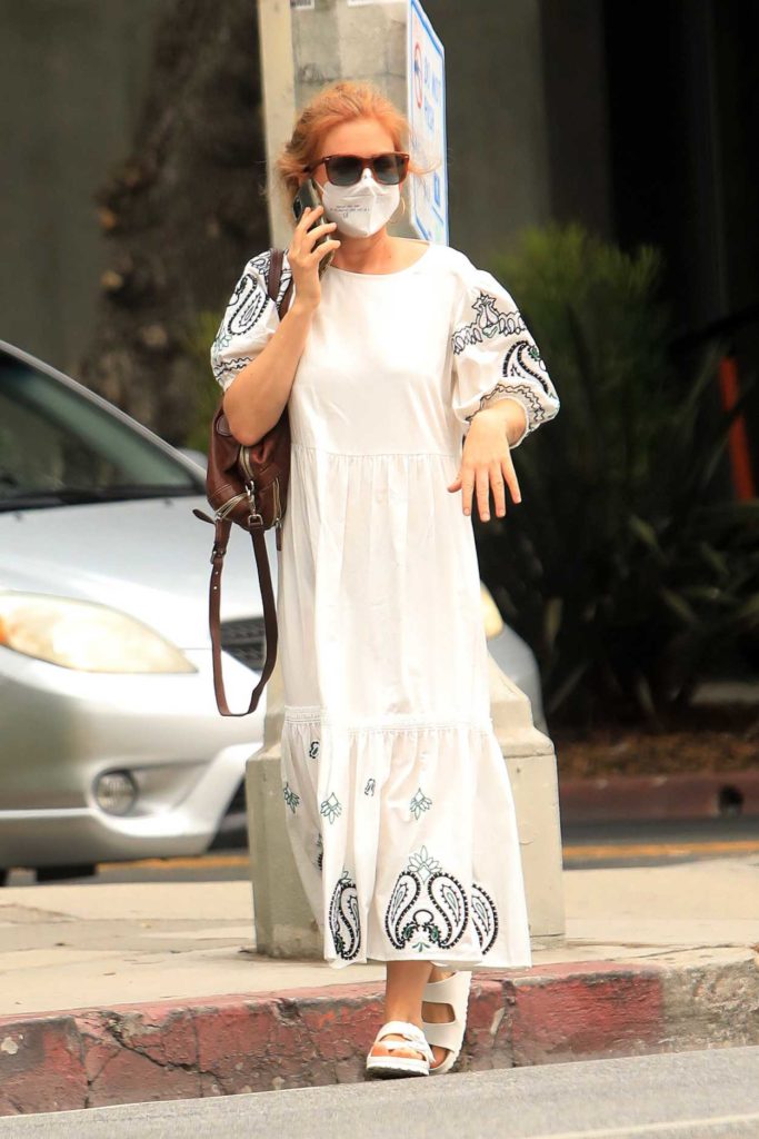 Isla Fisher in a White Dress