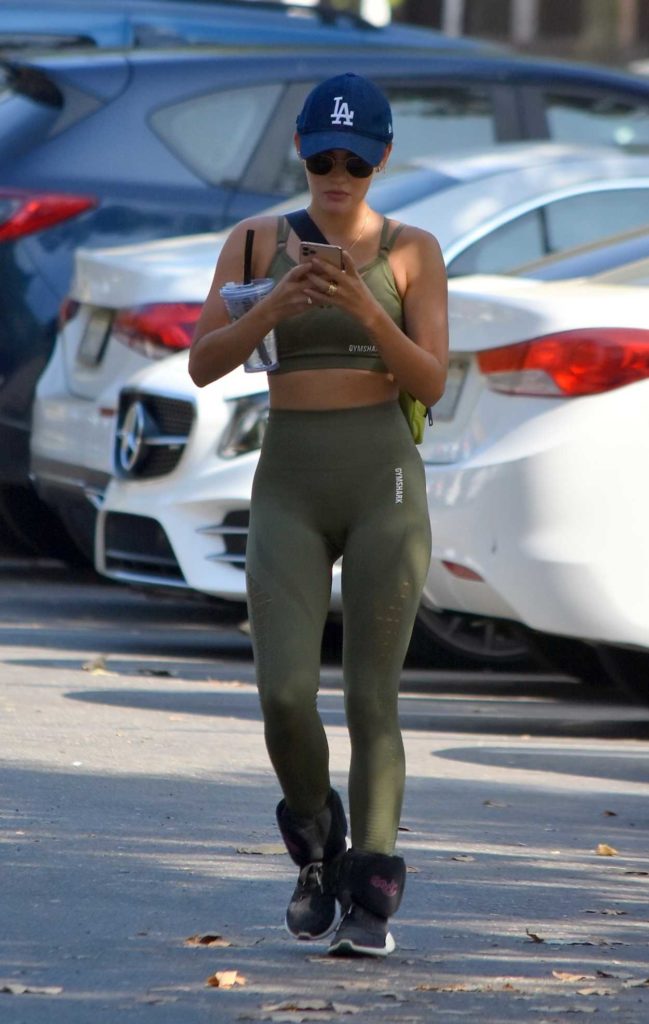 Lucy Hale in an Olive Workout Ensemble