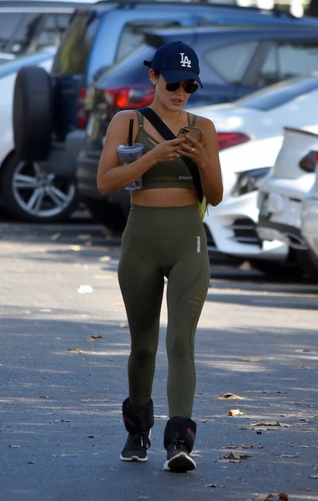 Lucy Hale in an Olive Workout Ensemble