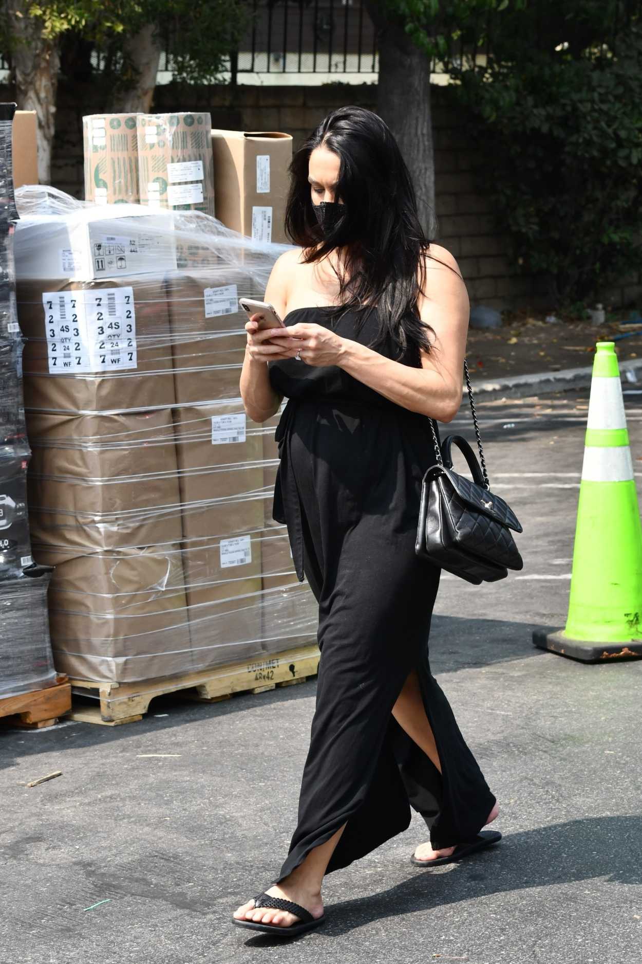 nikki bella rocks a black spandex jumpsuit and snakeskin boots while  visiting a friend in brentwood, california-290220_13