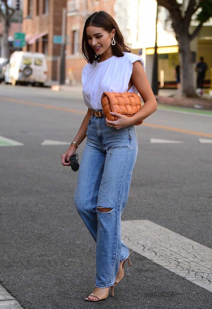 Olivia Culpo in a Blue Ripped Jeans