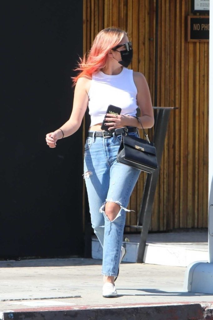 Ashley Benson in a Blue Ripped Jeans