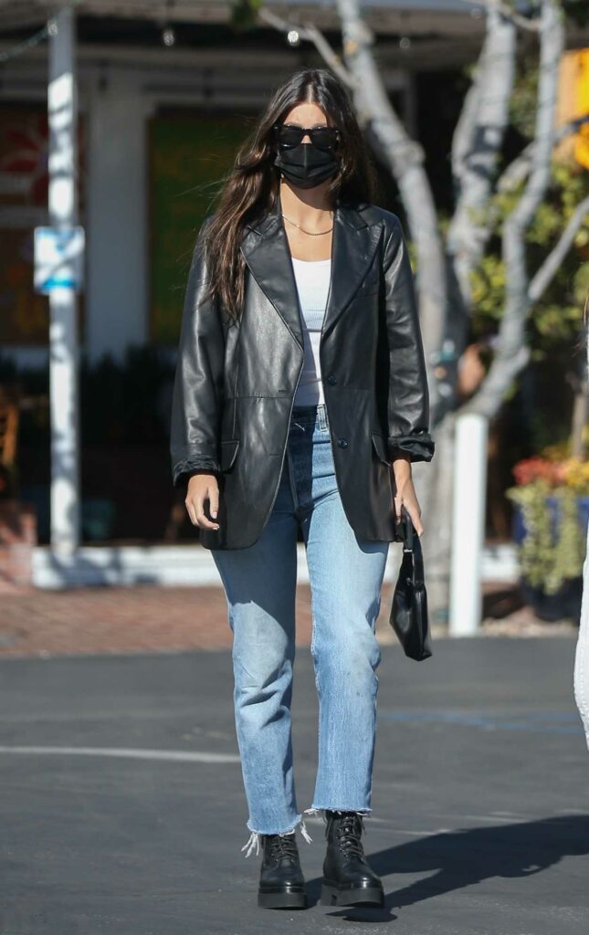 Camila Morrone in a Black Leather Blazer