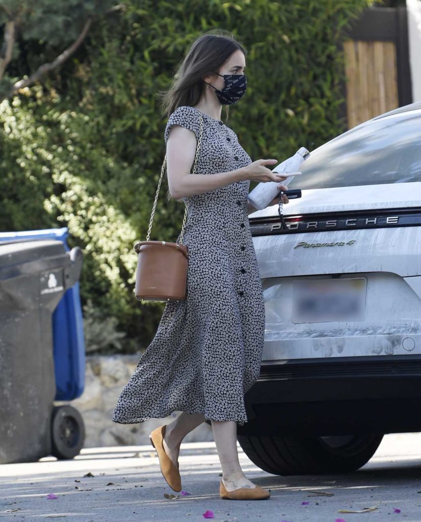 Lily Collins in a Grey Floral Dress