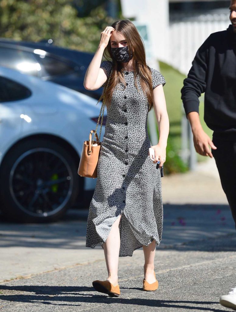 Lily Collins in a Grey Floral Dress
