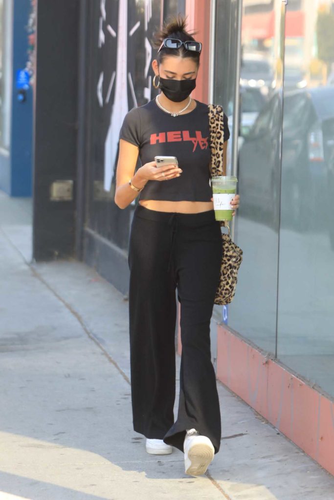 Madison Beer in a Black Protective Mask