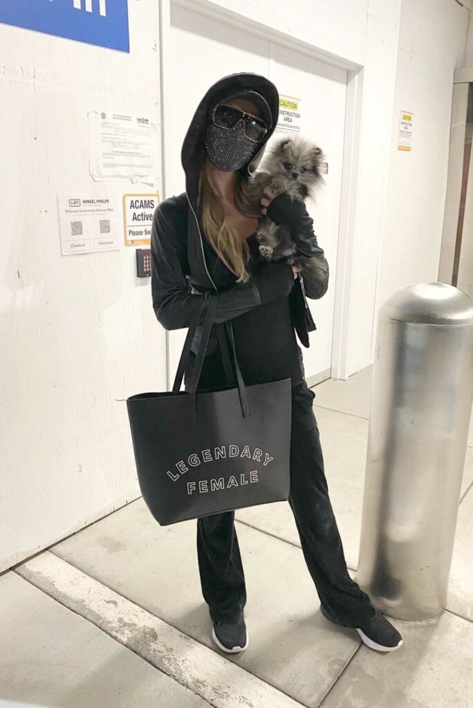 Paris Hilton in a Black Leather Jacket
