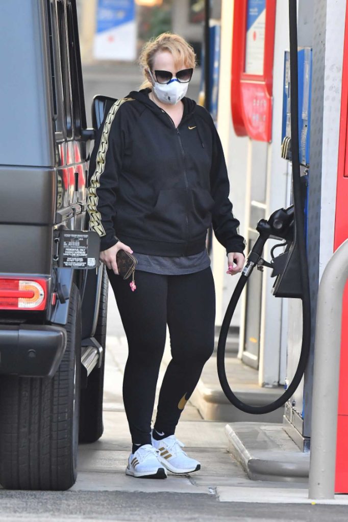 Rebel Wilson in a Protective Mask Stops by a Gas Station in West ...