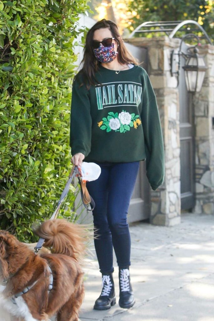 Aubrey Plaza in a Green Sweatshirt