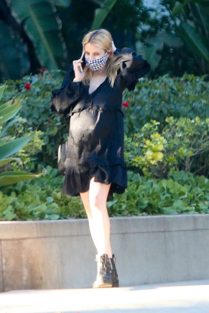 Emma Roberts in a Black Dress