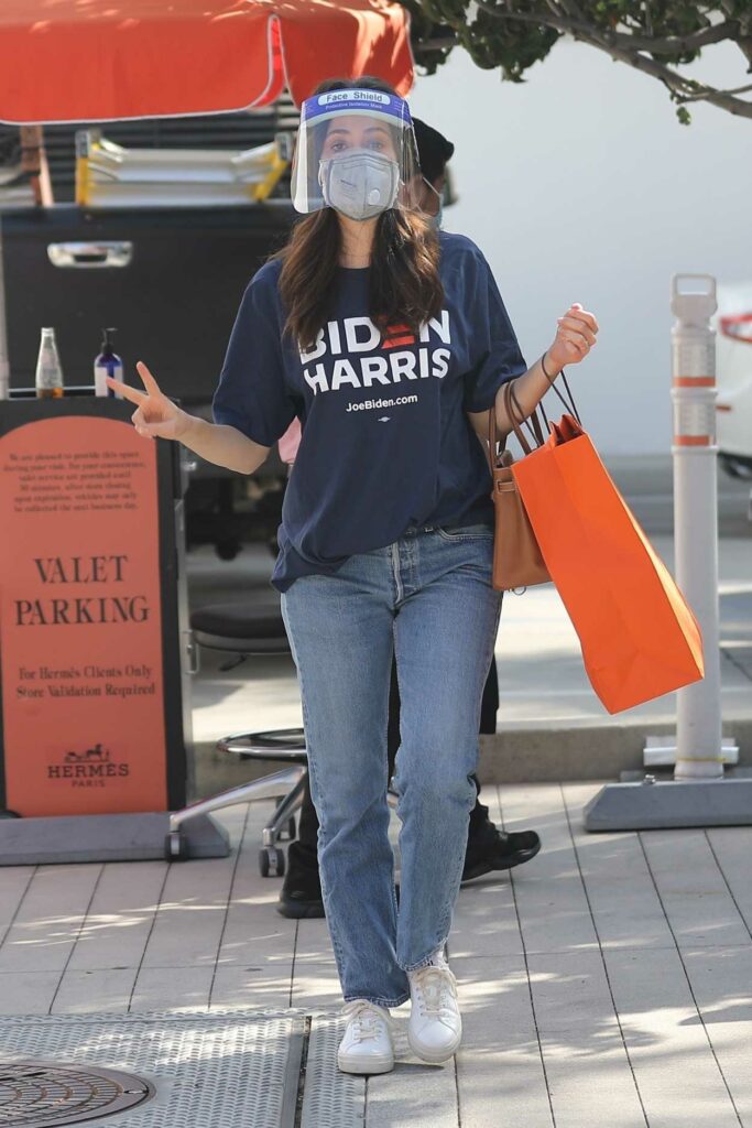 Emmy Rossum in a White Sneakers