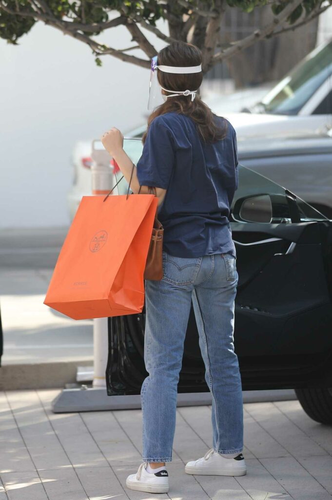 Emmy Rossum in a White Sneakers