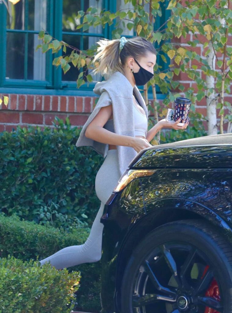 Hailey Bieber in a Black Protective Mask