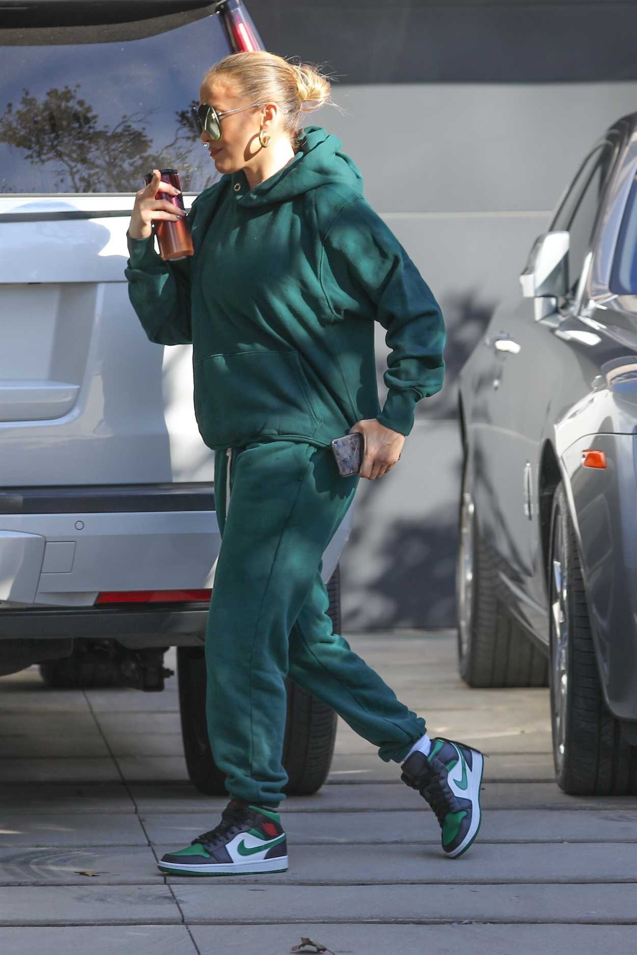 Jennifer Lopez in a Green Sweatsuit Arrives at the Recording Studio in Beverly Hills 11/14/2020