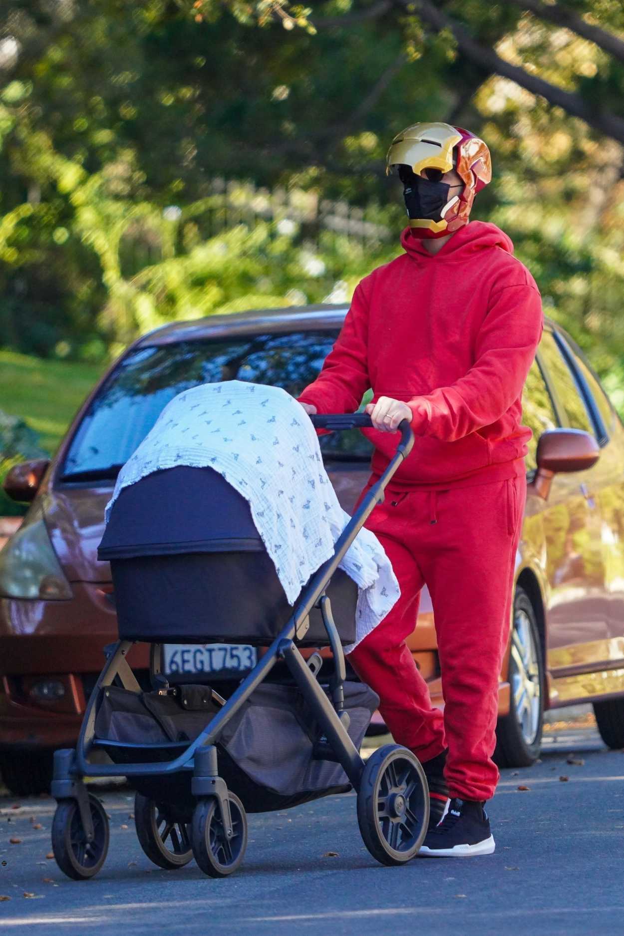 Joe Jonas Dressed as Iron Man Walks Out with His Daughter Willa in Los