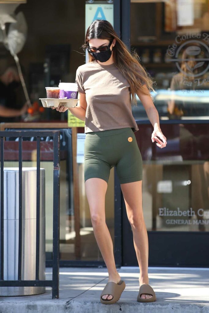 Kendall Jenner in a Green Spandex Shorts
